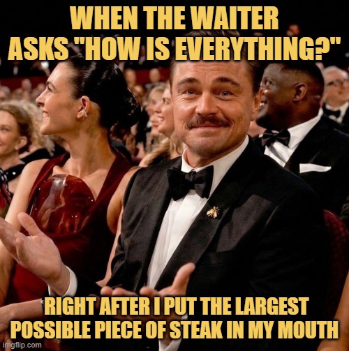 Trying to say everything is delicious with a mouth full of steak