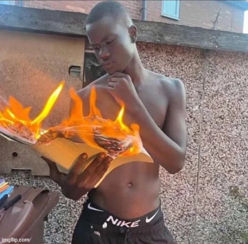 Black Man Reading Burning Book