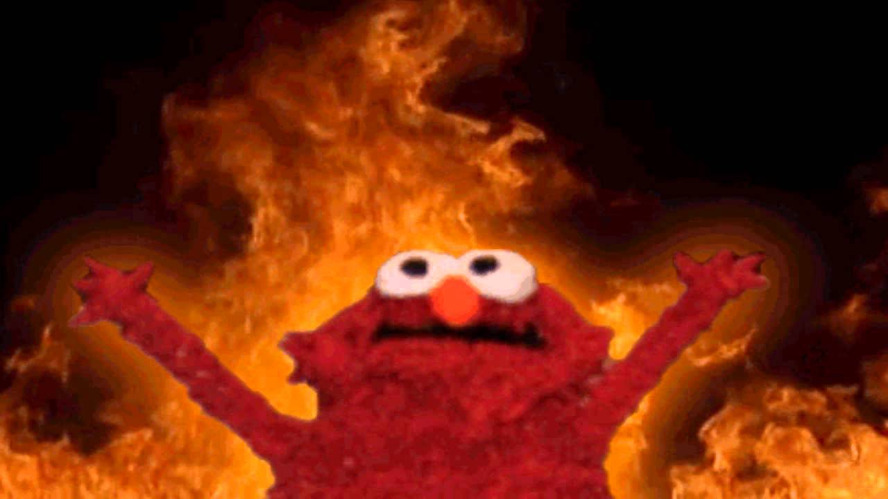 a red cartoon character burning in fire