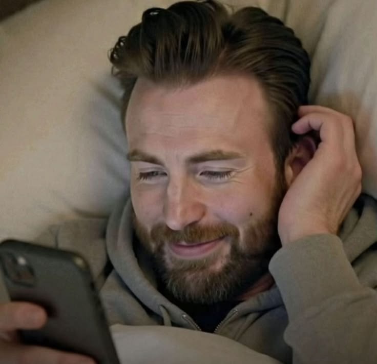 Captain america watching phone