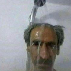  A man with a mustache is taking