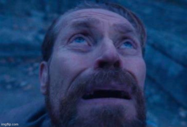 Willem Dafoe looking up