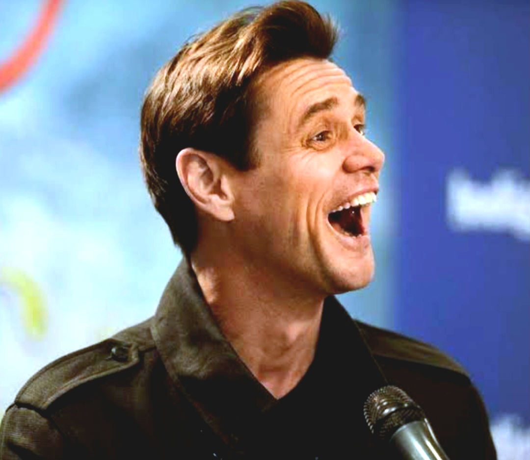 A man laughing during speech 