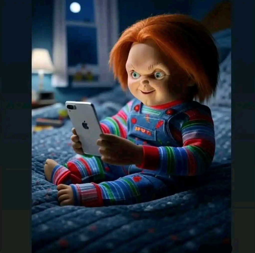 Horrible doll using phone 
