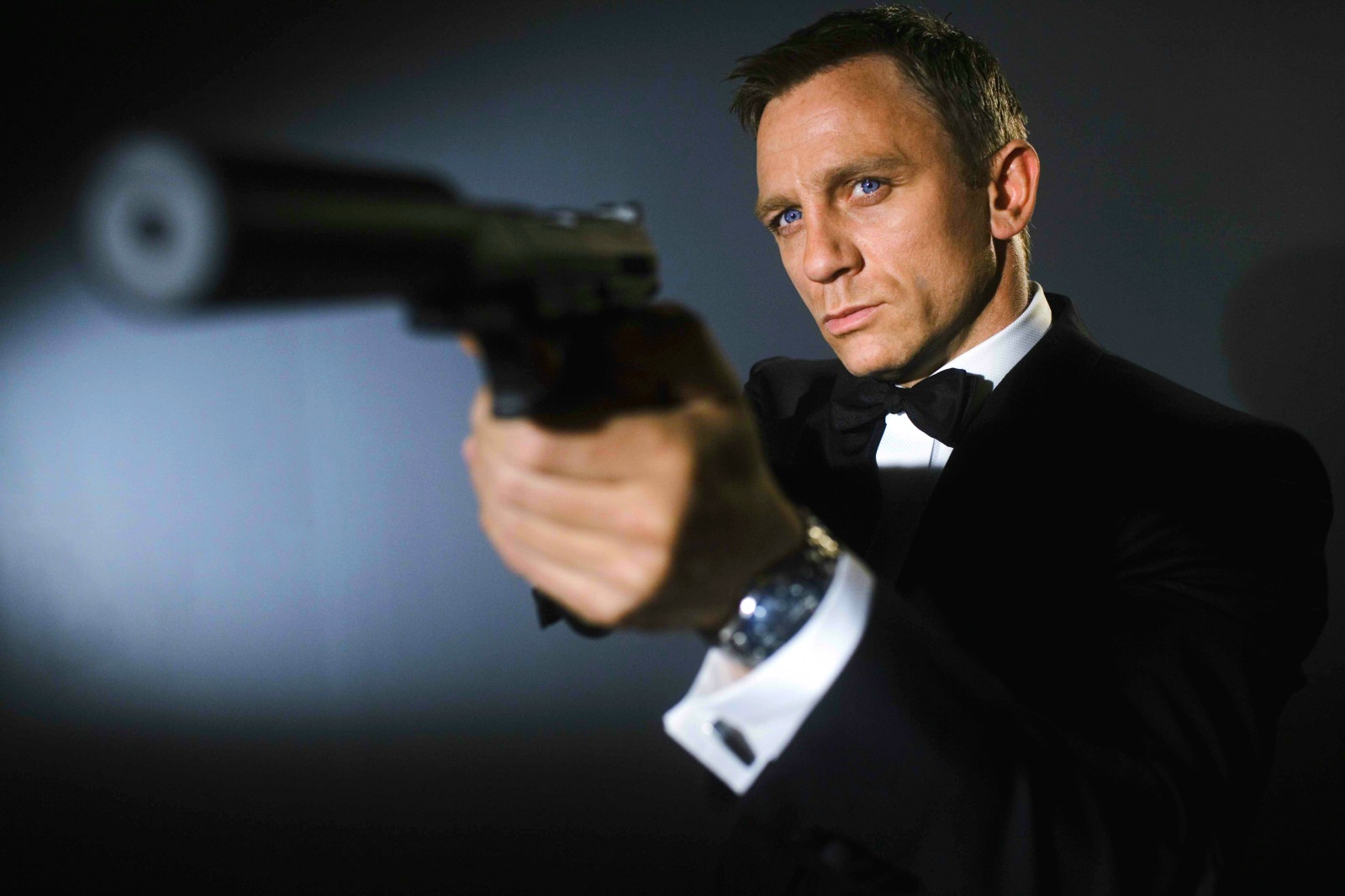 Serious man showing gun 