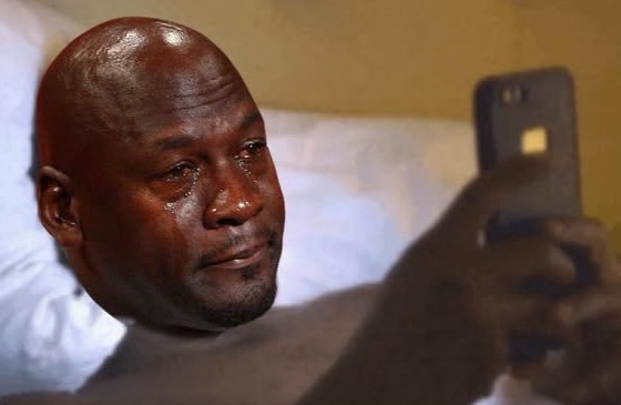 Black Guy Crying Looking At Phone 